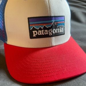 Patagonia Trucker hat. Adult, one size with adjustable band. Red, white and blue